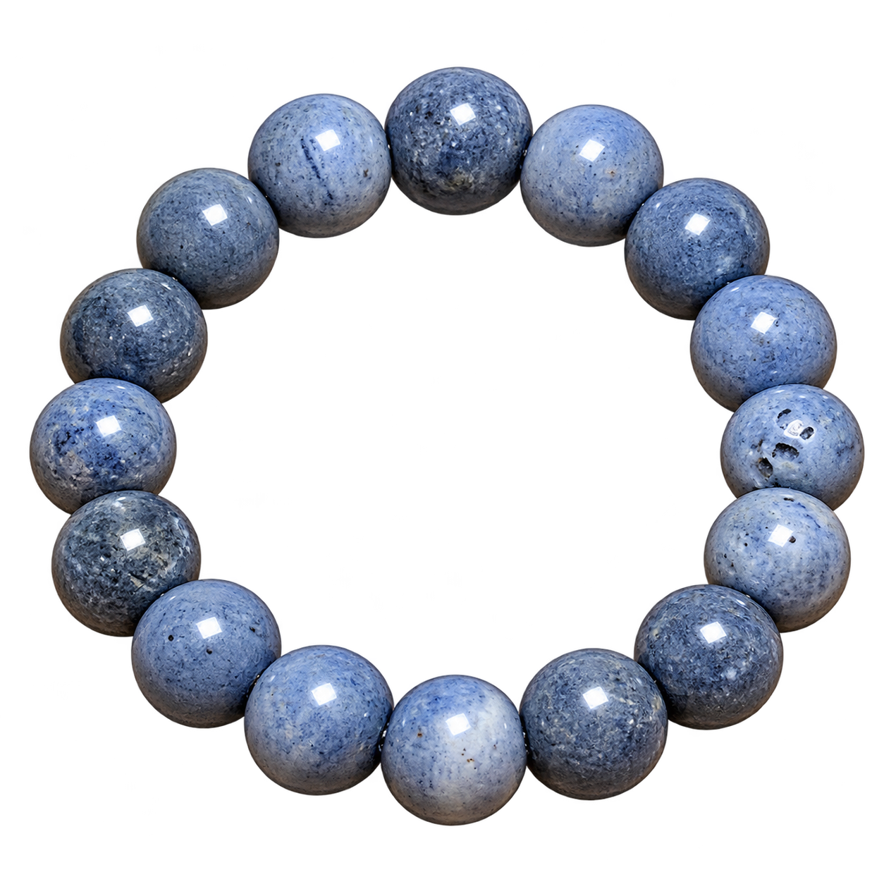 Blue coral bracelet featuring slate-blue and grey-blue speckled round beads on a neutral background.